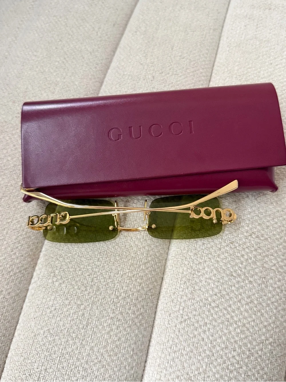Gucci women’s Rimless Logo Sunglasses in Green